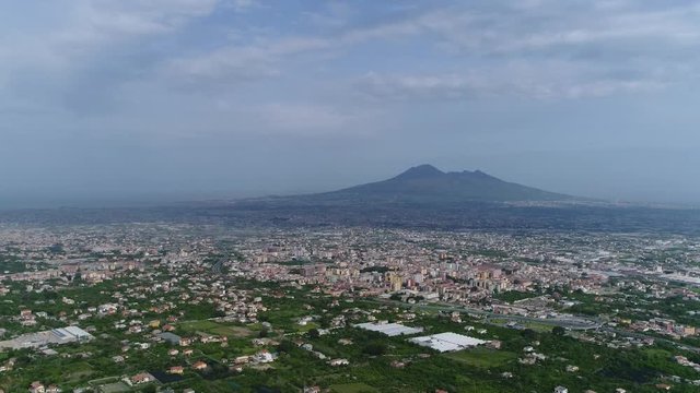 High altitude aerial Mount Vesuvius stratovolcano located on Gulf of Naples Italy the Vesuvius has erupted many times and is regarded as one of the most dangerous volcanoes in the world 4k quality