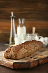 Loaf of bread on table. Fresh from oven