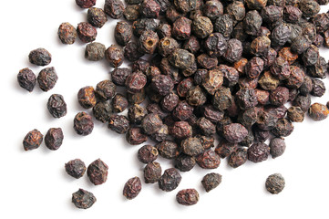 Dried hawthorn fruit on white background