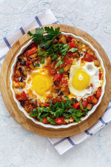 Dish is a traditional Israeli food shakshuka.