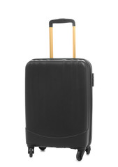 Black suitcase packed for journey on white background