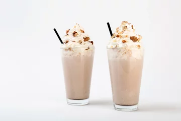 Papier Peint photo Lavable Milk-shake Glasses with delicious milk shakes on white background