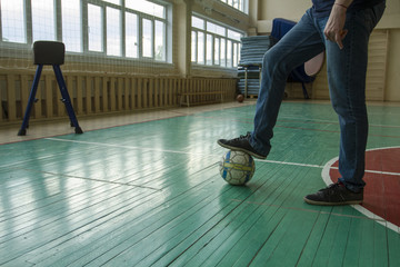 Old school gym. Sports Equipment. A test of a soccer ball