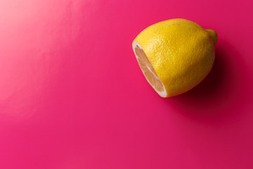 lemon on pink background