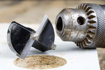 Milling cutter for fixing hinges in chipboard. Joinery accessories for furniture construction.