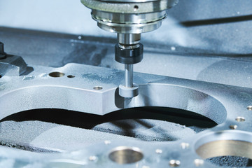 grinding or polishing metal detail on CNC machine.