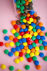 Glass Glass Filled Candy. Rose Background. Colored Candy. Diet. Healthful Nutrition. High Resolution