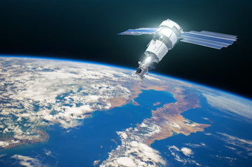 Obraz na płótnie Canvas Research, probing, monitoring of in atmosphere. Communications satellite in orbit above the surface of the planet Earth. Elements of this image furnished by NASA.
