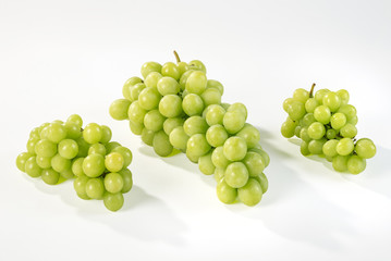 Fresh bunch of grapes isolated on white