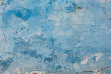 Obraz premium Blue old rustic wall in cracks