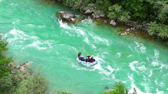 Aerial shot of people in boat whitewater rafting trip on Tara river in Montenegro
