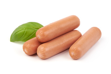 Fresh boiled sausages with herbs isolated on white background. Close-up.