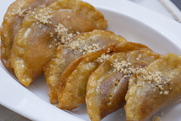 Qatayef dough in Ramadan month, Arabic sweets, Qatayef or Katayef is a Levantine dessert commonly served during the month of Ramadan, a sort of sweet dumpling filled with cream or nuts