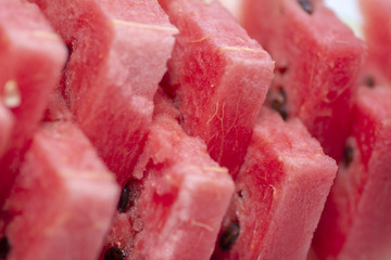 closeup to ripe fresh watermelon with seeds, closeup to watermelon slices