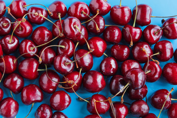 sweet cherry ripe on blue background, background, postcard, summer, fruit, healthy food