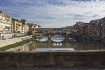 Obraz premium Day view of historic Ponte Vecchio bridge in Florence, Italy