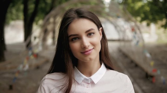Natural Pretty Brunette Girl Portrait In Nature