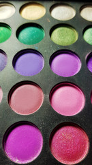 Obraz na płótnie Canvas eye shadow palette close up multi colors 