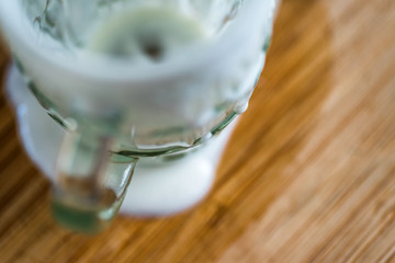 Closeup overhead view of empty fresh kefir probiotik drink on kitchen table