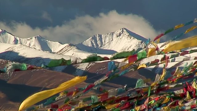 Prayer Flags Blowing & Snowy Peaks, Tibet