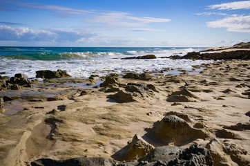 Fototapeta na wymiar Rye Back Beach rocks 
