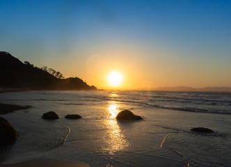 Sunset on the beach in Byron Bay, Australia