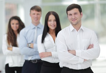 business team and their leader in the foreground