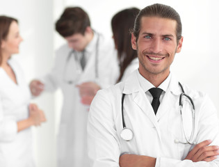 Fototapeta premium smiling doctor therapist on blurred background.