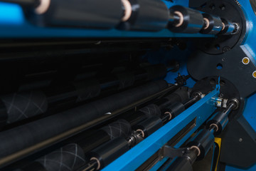 Ribbon slitter in a TTR wharehouse and production factory