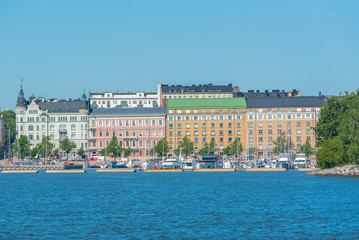 Fototapeta na wymiar Helsinki in Finland, panorama of the town from the sea, with beautiful colorful buildings 