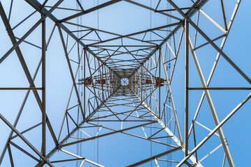 electricity pylon with blue sky
