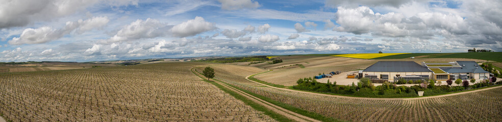 Vineyards and unidentified wine making facility in the Chablis region of Burgundy, France