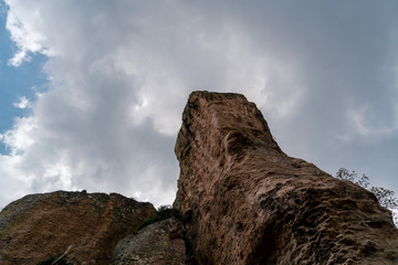 great view of the landscape in a rocky mountain with a dark and moody clouds