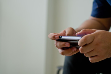 close up hand typing smartphone with copy space for text, shopping online, sending email, man play phone, use smartphone, mobile phone, telephone