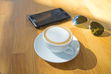 hot coffee cup on table at morning. relax time