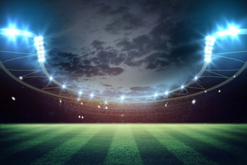 Fototapeta na wymiar lights at night and football stadium 3d rendering. Mixed photos