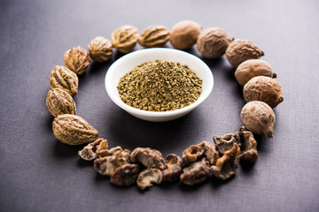 Indian ayurvedic Triphala churan or trifala powder is an ancient medicine for bowel movement or indigestion problems. Selective focus