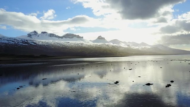 Aerial: Backing Up and Navigating Fjord in Iceland