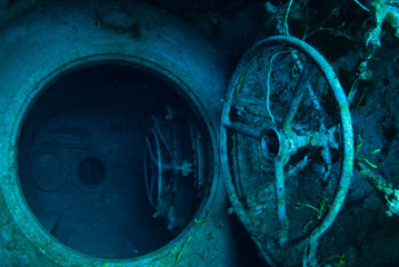 An underwater shot inside a room in the shipwreck of the Kittiwake that uses natural light as...