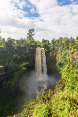 Landscape with a waterfall surrounded by jungle. Thompson Waterfall. Kenya, Africa