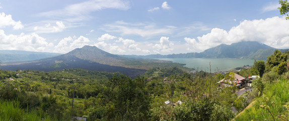 Panoramic view of the volcano of Batur and the mountain kintamani on a clear day in the north east of the island of Bali