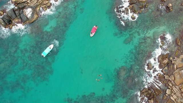 Aerial Top Hover View of People Snorkeling