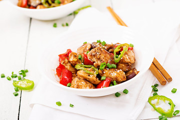 Homemade kung pao chicken with peppers and vegetables. Chinese food. Stir fry.