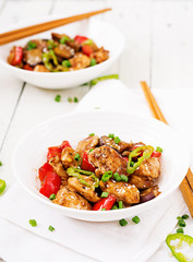Homemade kung pao chicken with peppers and vegetables. Chinese food. Stir fry.