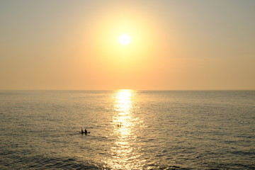 sun with kayak