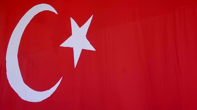 flag of Turkey, which depicts the month and the star