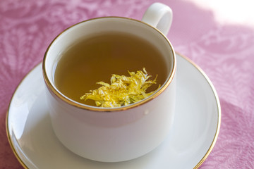 green flower tea with chrysanthemum