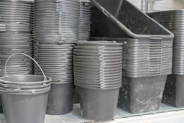 black plastic  baskets stacks
