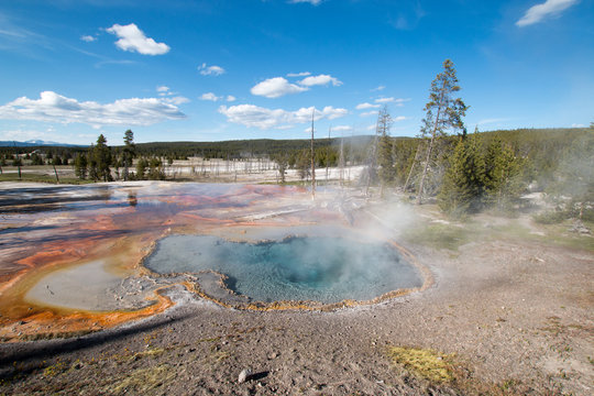 Steam on Firehole Spring on Firehole Lake Drive in Yellowstone National Park in Montana United States
