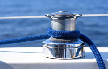 Yacht Sailing Cleat With Tied Up Rope